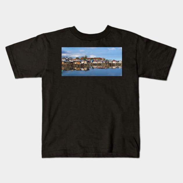 Stilt houses Kids T-Shirt by likbatonboot